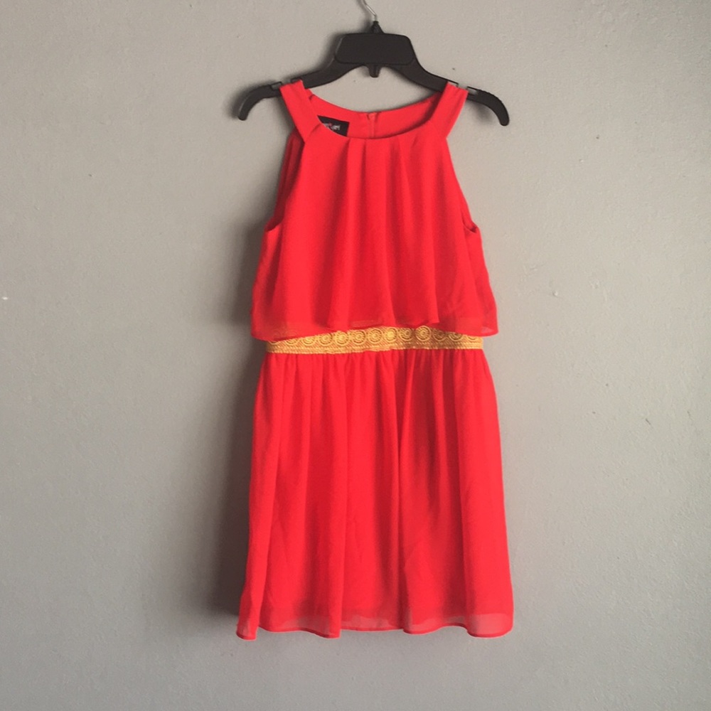 Red Dillard’s in a girl dress